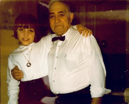 Pettis as a girl with her grandfather